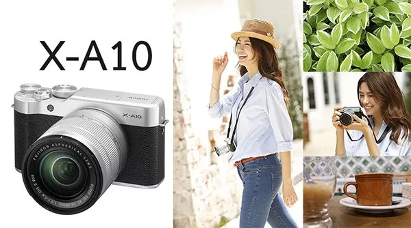 alt text: Máy ảnh Fujifilm X-A10 màu đen, ống kính đen, đặt nghiêng trên bàn gỗ