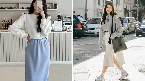 alt text: Phối áo hoodie croptop với chân váy lưng cao